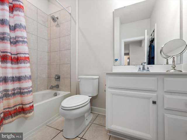 full bathroom with shower / tub combo with curtain, tile patterned flooring, vanity, and toilet