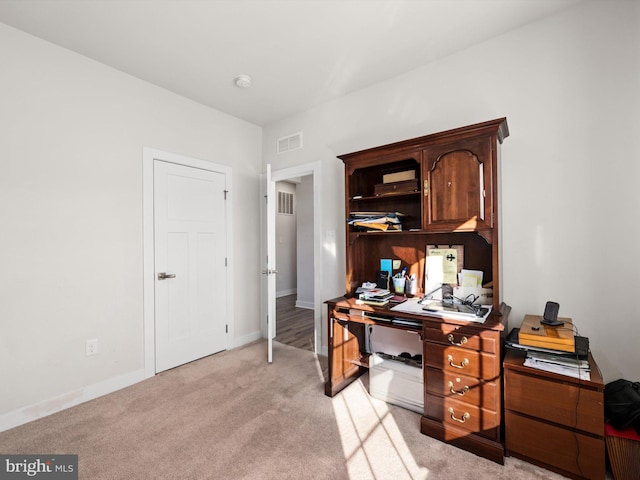 view of carpeted home office