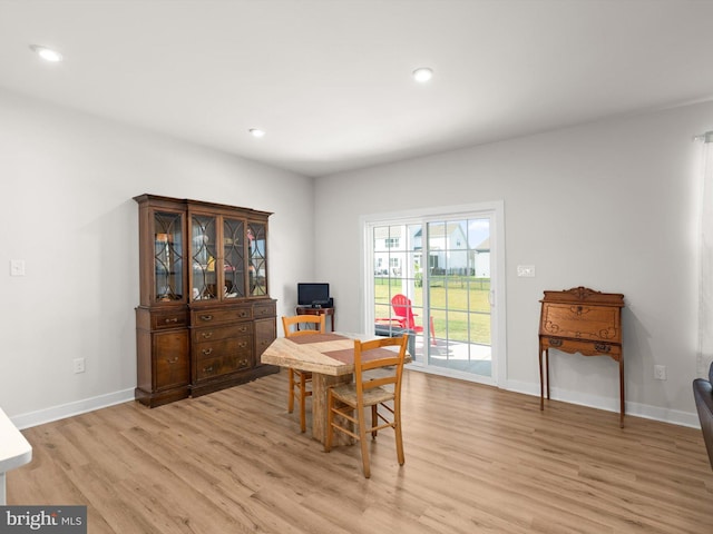 dining room with light wood-type flooring