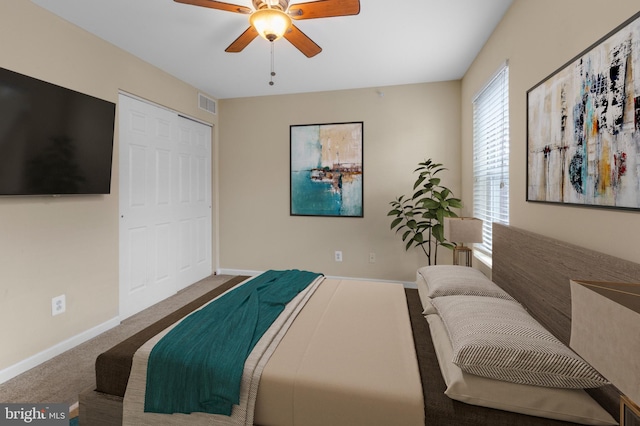 bedroom featuring a closet, carpet floors, and ceiling fan