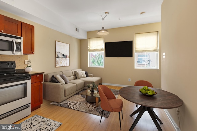 living room featuring light hardwood / wood-style floors