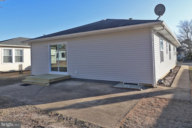 back of house with a patio area