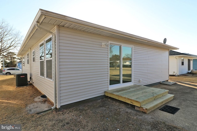 view of property exterior featuring central AC