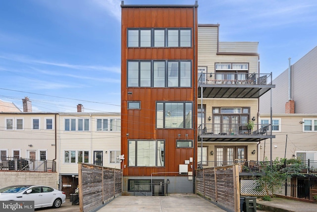 view of front of property with a balcony