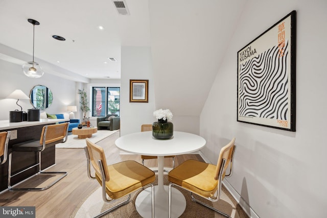 dining room featuring light hardwood / wood-style flooring