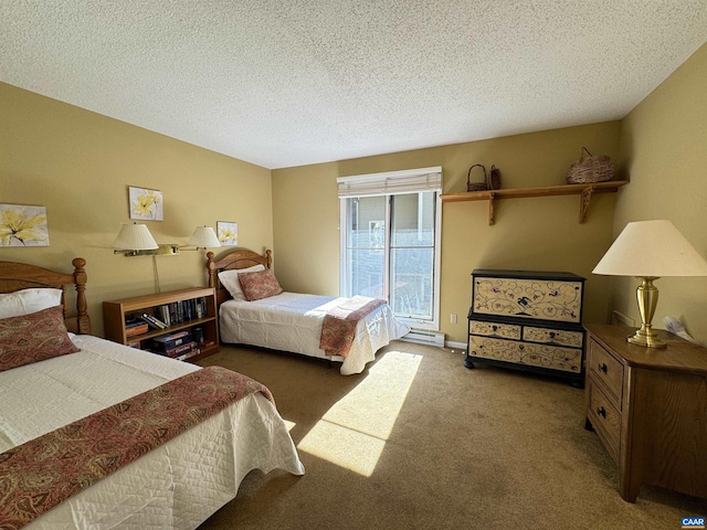 carpeted bedroom featuring a textured ceiling