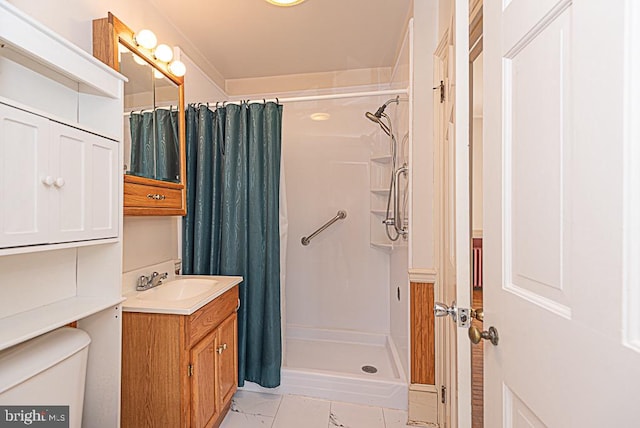 bathroom with vanity, a shower with curtain, and toilet