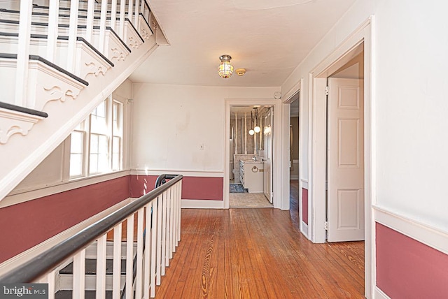 corridor featuring hardwood / wood-style flooring