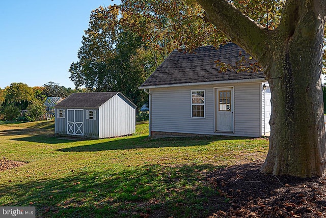 view of outdoor structure with a lawn