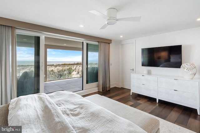 bedroom featuring access to exterior, ceiling fan, and dark wood-type flooring