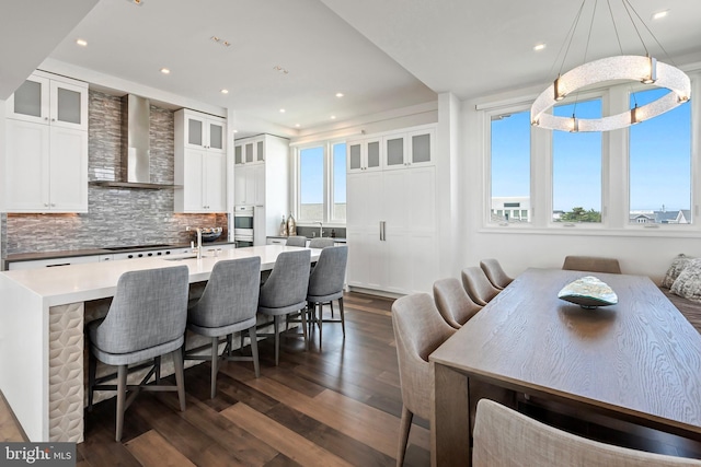 dining room with dark hardwood / wood-style floors