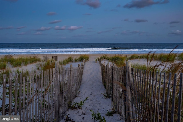 property view of water featuring a view of the beach