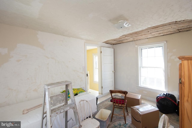 interior space with a textured ceiling