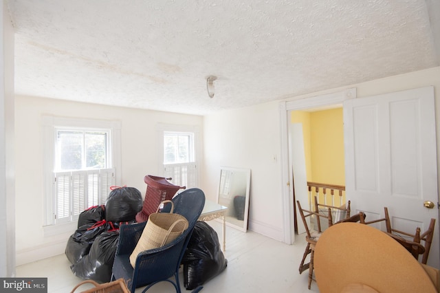 interior space with a textured ceiling