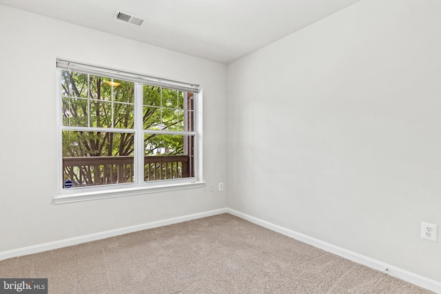 view of carpeted spare room