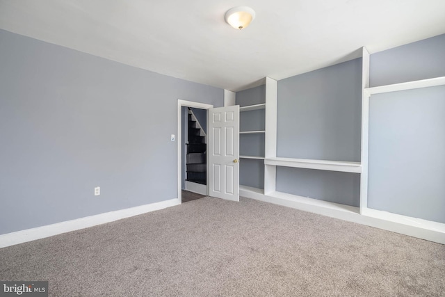 unfurnished bedroom featuring carpet flooring