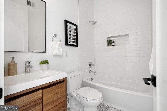 full bathroom featuring toilet, vanity,  shower combination, and tile patterned flooring