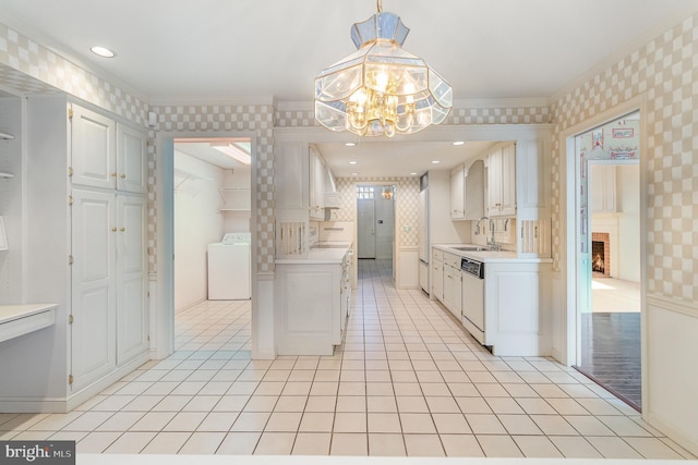 17 Kensington Sq, Mechanicsburg, PA 17050 - kitchen with white dishwasher, wallpapered walls, light countertops, and washer / clothes dryer
