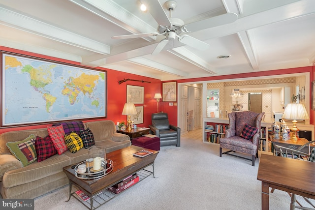 carpeted living room with beamed ceiling, crown molding, and ceiling fan