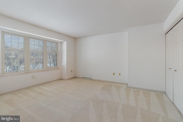 17 Kensington Sq, Mechanicsburg, PA 17050 - unfurnished bedroom featuring baseboards, a closet, and carpet