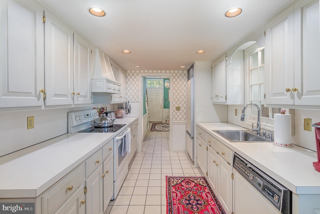17 Kensington Sq, Mechanicsburg, PA 17050 - kitchen with custom exhaust hood, a sink, white appliances, light tile patterned floors, and recessed lighting