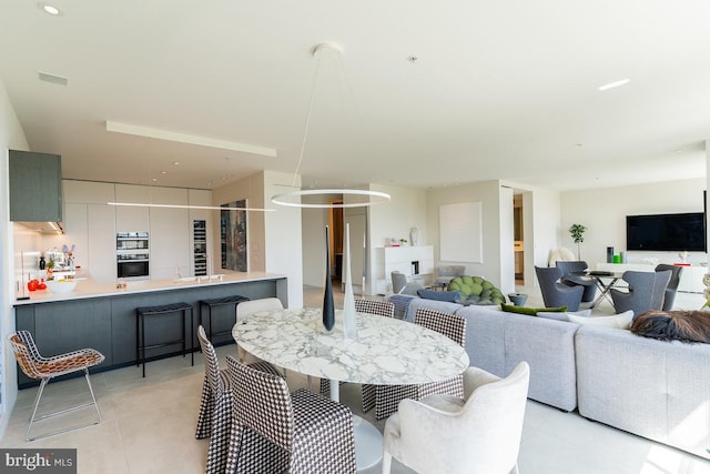 dining area featuring a fireplace