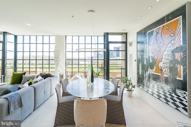 sunroom with an inviting chandelier