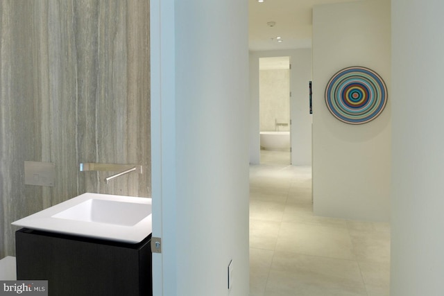 bathroom with vanity and tile patterned floors