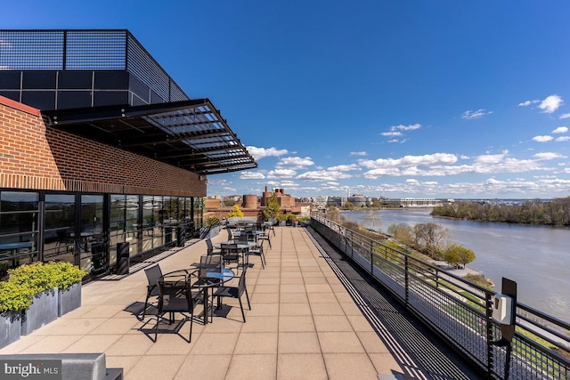 view of patio / terrace featuring a water view