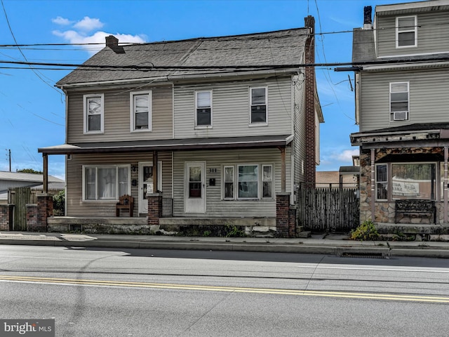 view of property with a porch