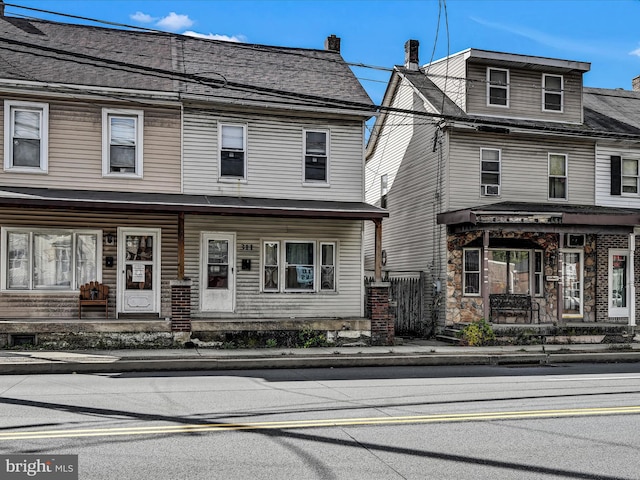 view of front of property featuring covered porch