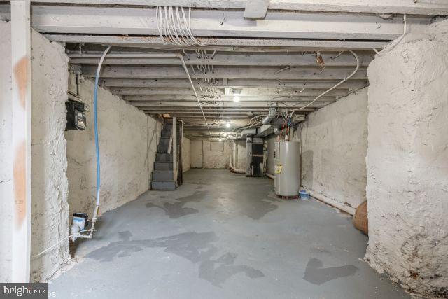 basement featuring gas water heater