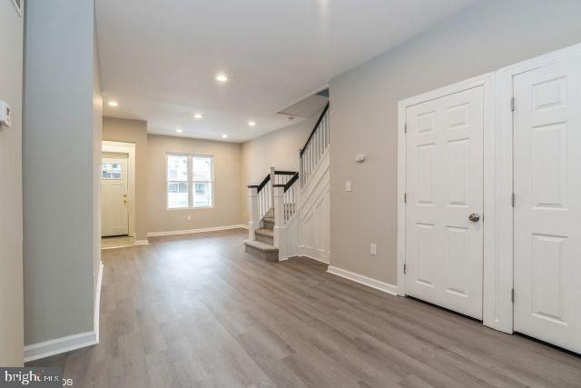 foyer with light wood-type flooring