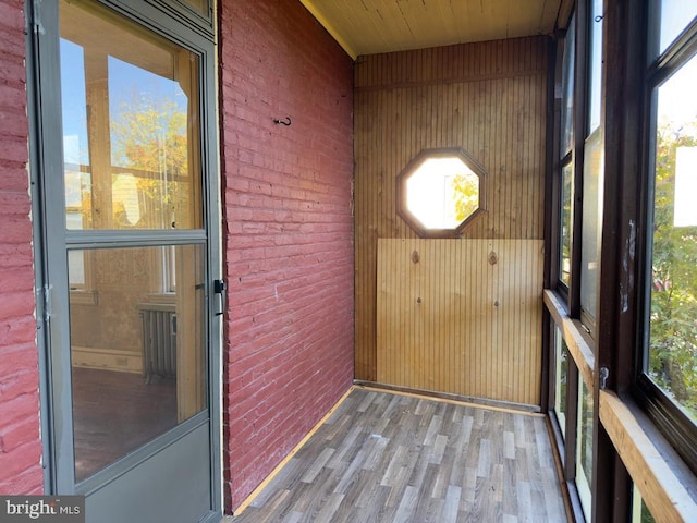 unfurnished sunroom with a healthy amount of sunlight