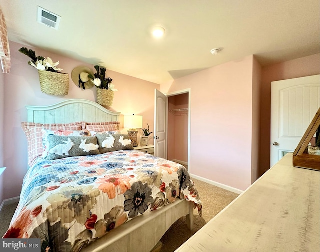 bedroom with carpet floors and a closet