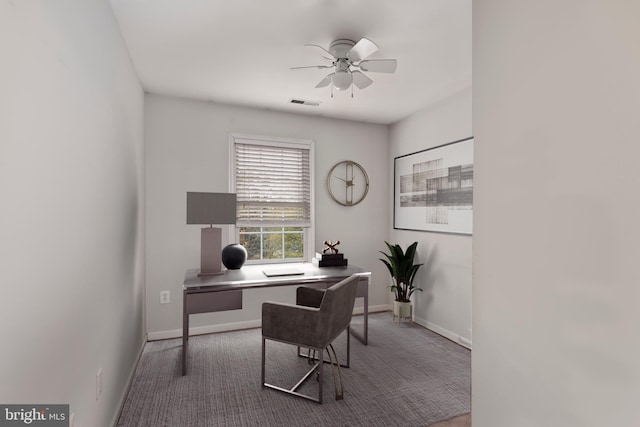 home office featuring carpet floors and ceiling fan