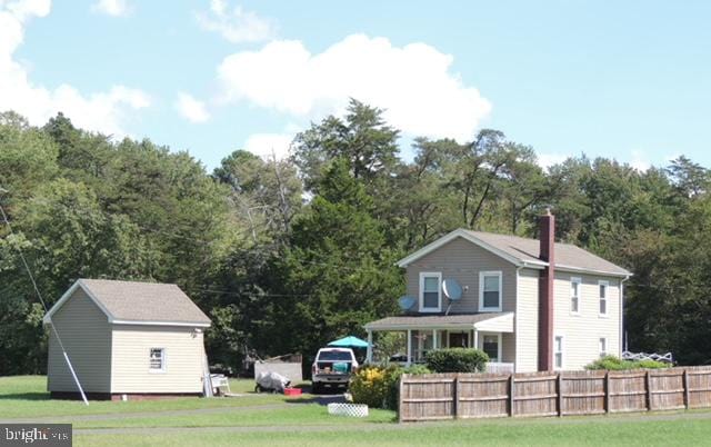 exterior space featuring a front lawn