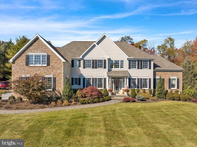 view of front of home with a front lawn