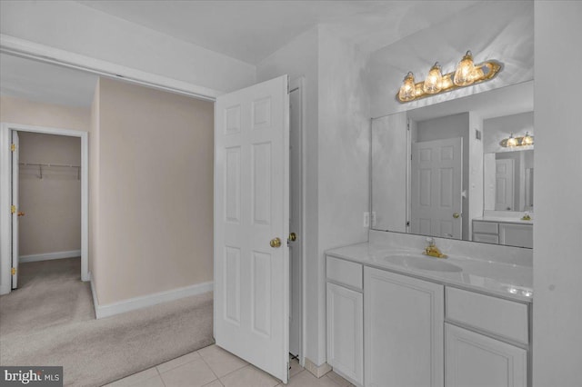 bathroom with vanity and tile patterned flooring