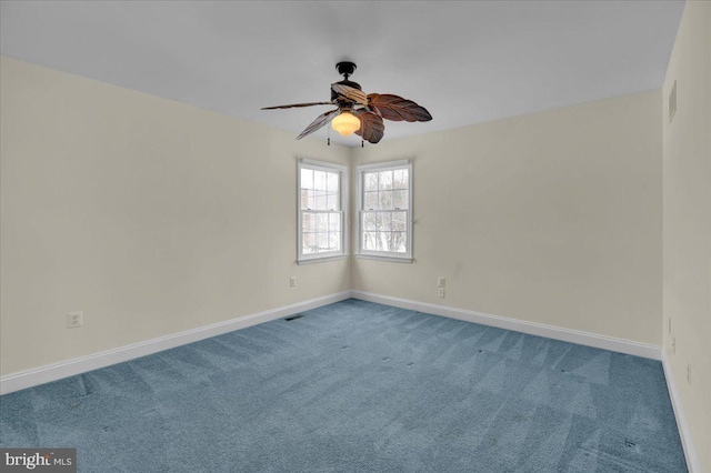 carpeted empty room with ceiling fan