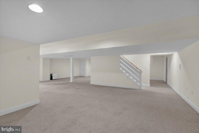 basement with light carpet