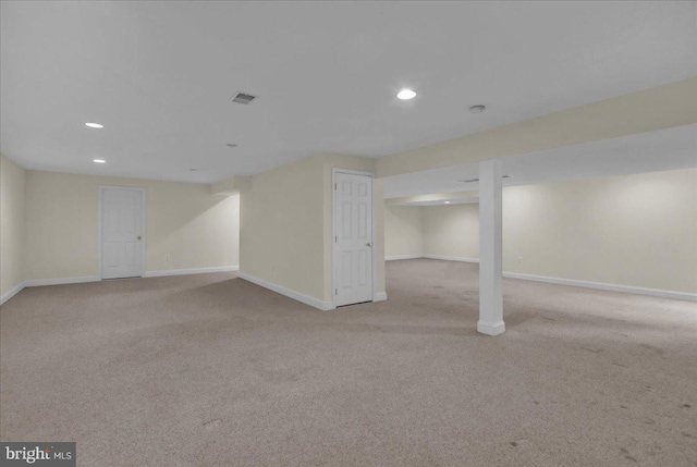 basement with light colored carpet