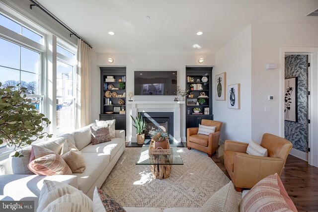 living room with hardwood / wood-style flooring