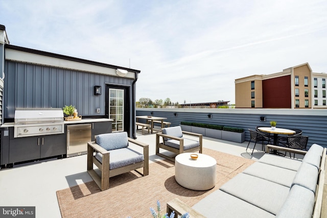 view of patio / terrace featuring an outdoor living space and area for grilling