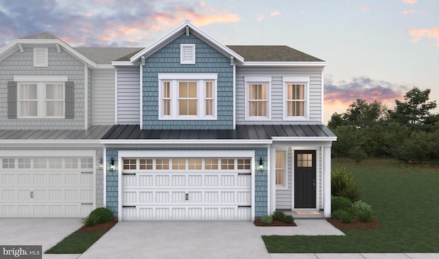 view of front of house with a garage