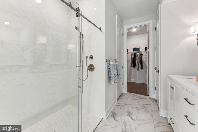 bathroom with a shower with shower door