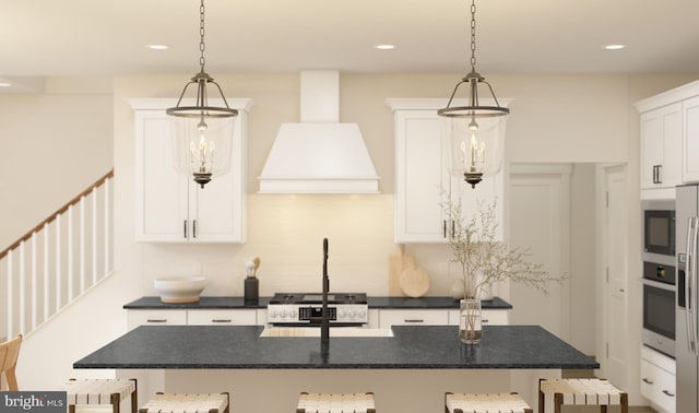 kitchen with pendant lighting, custom exhaust hood, a kitchen breakfast bar, and stainless steel appliances