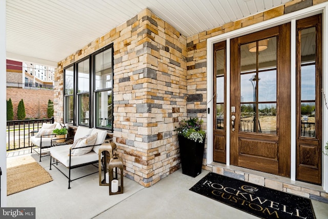 entrance to property with covered porch