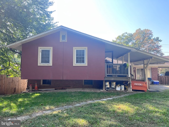 view of property exterior with a yard