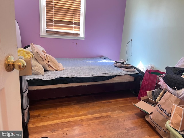 bedroom featuring hardwood / wood-style floors